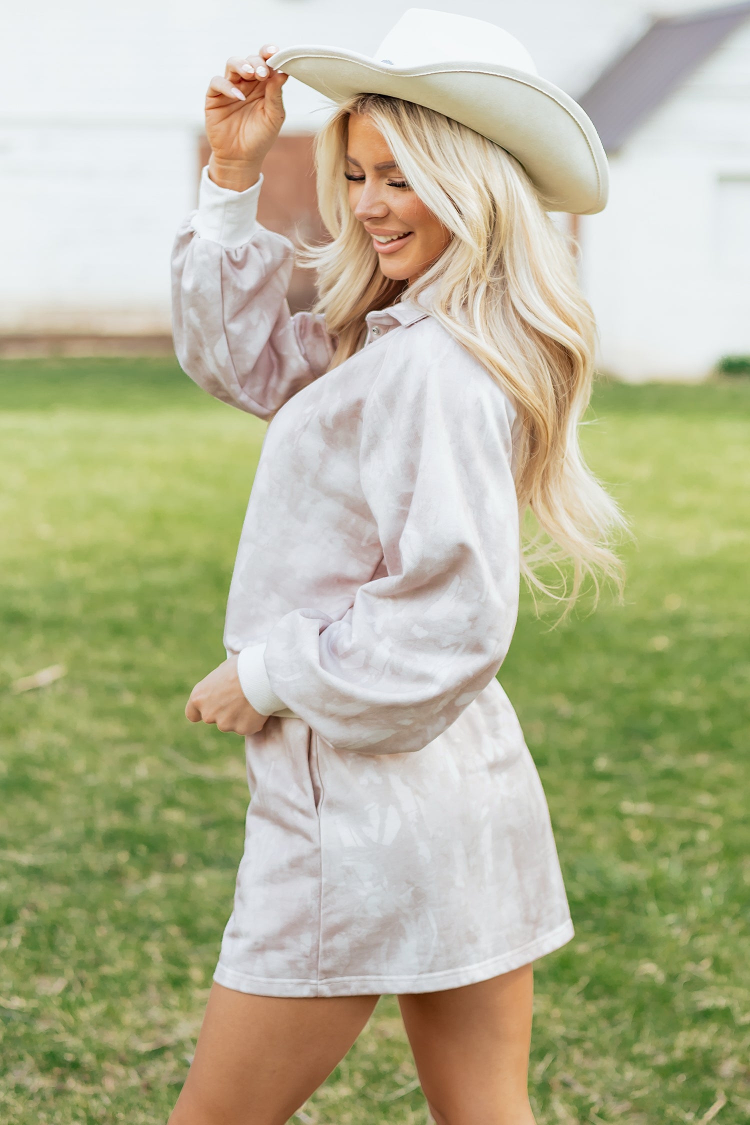 White abstract woodland print mini skort and balloon sleeve pullover set for women, featuring a drawstring waist and stylish two-piece design.