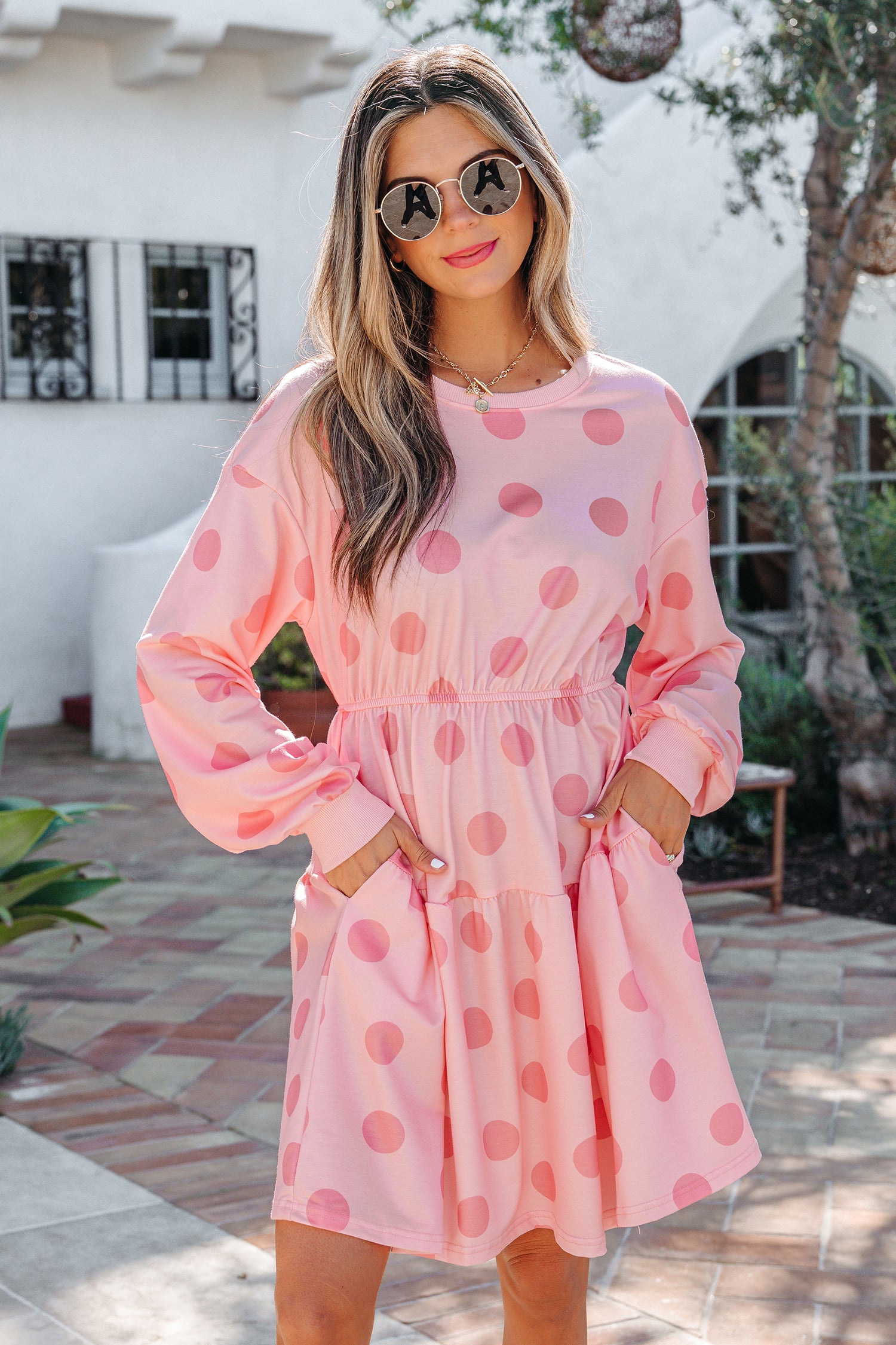 Pink polka dot printed long sleeve mini dress for women by Dear-Lover, featuring a flared style perfect for casual or dressy occasions.