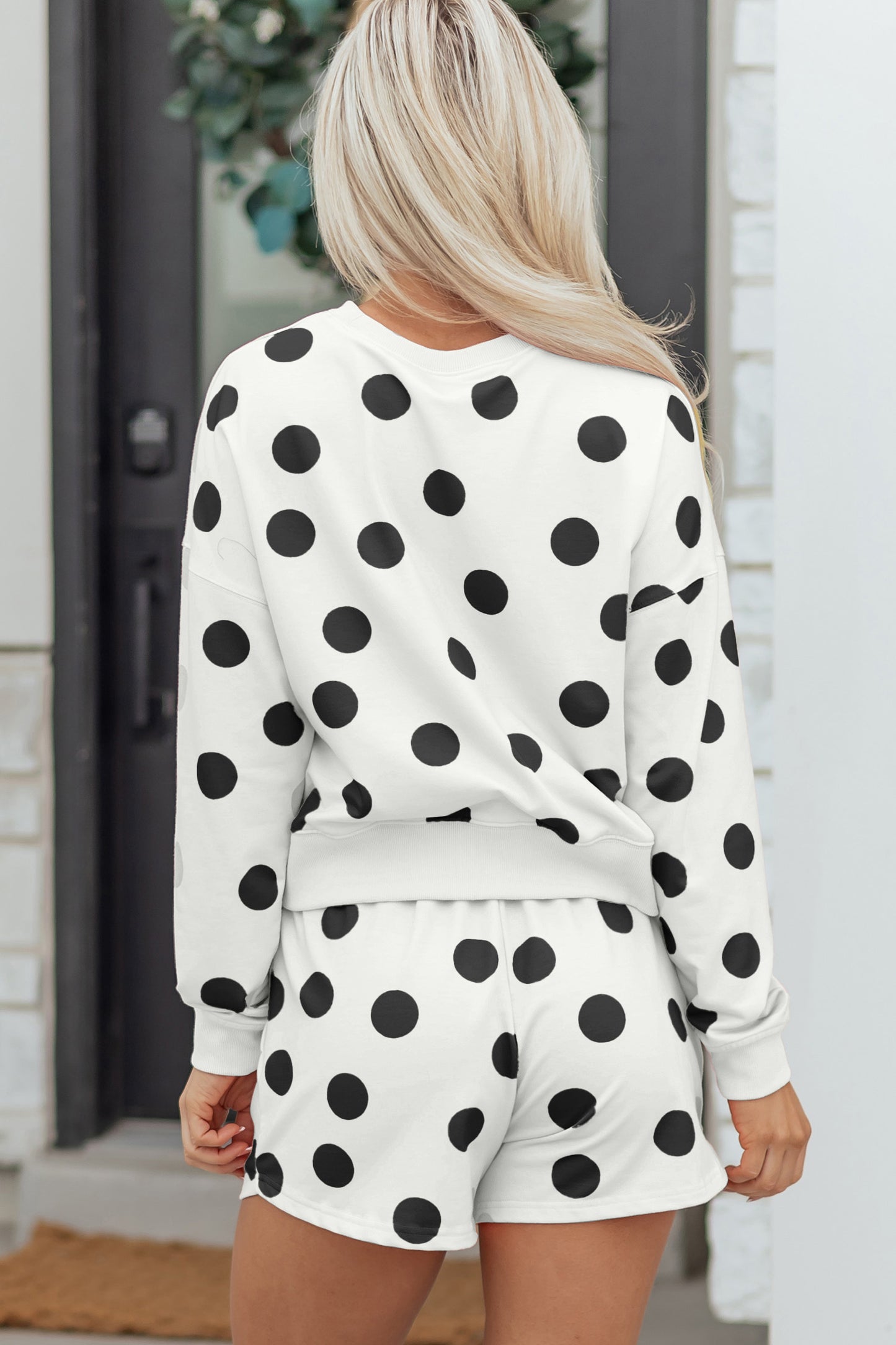 Beige polka dot print drop shoulder pullover and drawstring shorts set for women by Dear-Lover, casual two-piece summer outfit.
